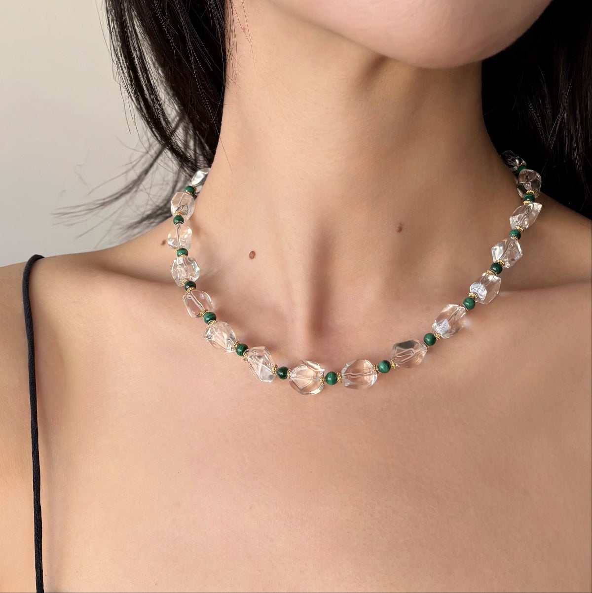 Necklace with malachite beads and clear crystal quartz stones