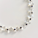 Geometric white quartz necklace with navy lapis beads