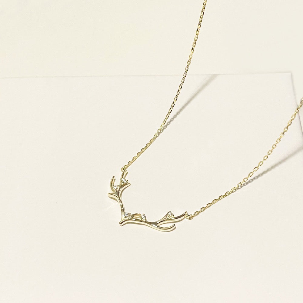 gold antlers necklace, holiday gift, holiday gift idea, antler motif jewelry, gold chain aesthetic, dainty christmas necklace, dainty necklace, dainty gold necklace, antlers necklace, Christmas necklace, Christmas jewelry, Christmas gift