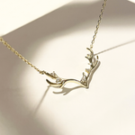 gold antlers necklace, holiday gift, holiday gift idea, antler motif jewelry, gold chain aesthetic, dainty christmas necklace, dainty necklace, dainty gold necklace, antlers necklace, Christmas necklace, Christmas jewelry, Christmas gift