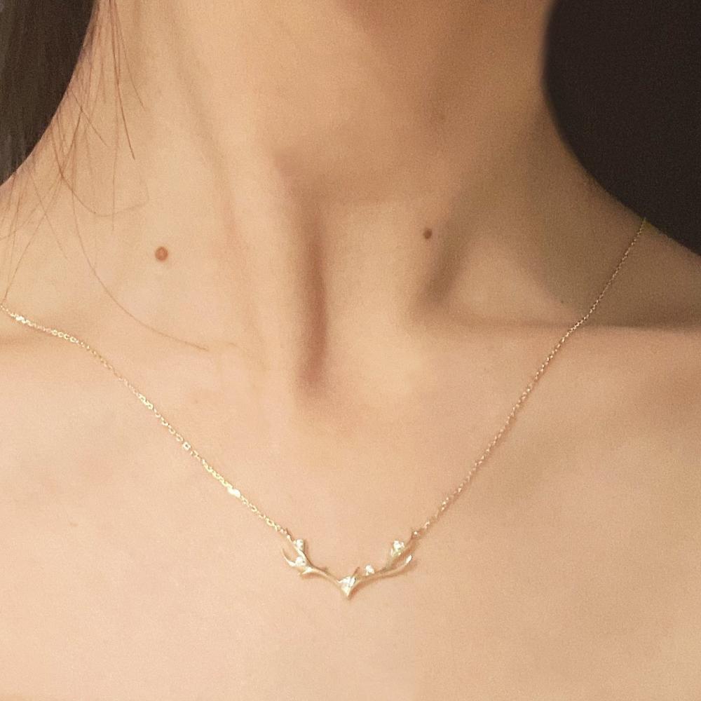 gold antlers necklace, holiday gift, holiday gift idea, antler motif jewelry, gold chain aesthetic, dainty christmas necklace, dainty necklace, dainty gold necklace, antlers necklace, Christmas necklace, Christmas jewelry, Christmas gift