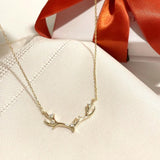 gold antlers necklace, holiday gift, holiday gift idea, antler motif jewelry, gold chain aesthetic, dainty christmas necklace, dainty necklace, dainty gold necklace, antlers necklace, Christmas necklace, Christmas jewelry, Christmas gift