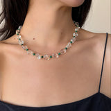 Necklace with malachite and clear crystal quartz beads 